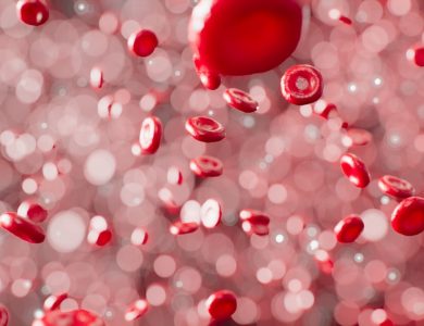 a bunch of red bubbles floating in the air