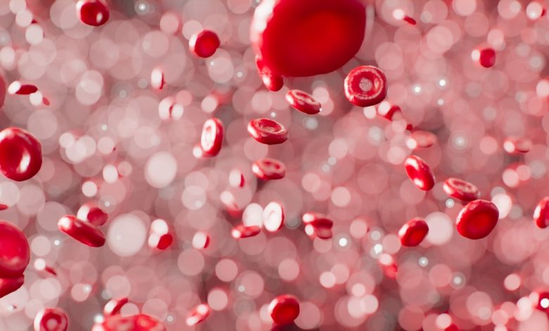 a bunch of red bubbles floating in the air