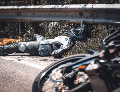 a person lying on a bench