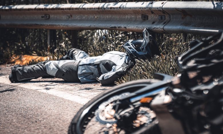 a person lying on a bench